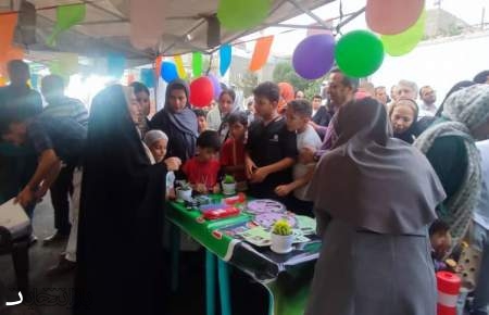 گزارش تصویری از برگزاری جشن عید سعید غدیر خم در محله " گلشن" شهرداری منطقه 4- عکاس با موبایل: نادیا کمانکش  